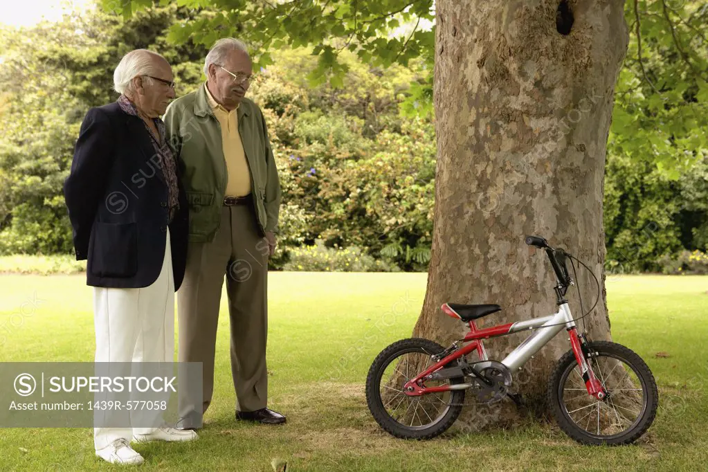 Older men in garden & bicycle