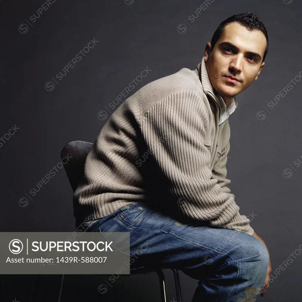 Portrait of man on a chair