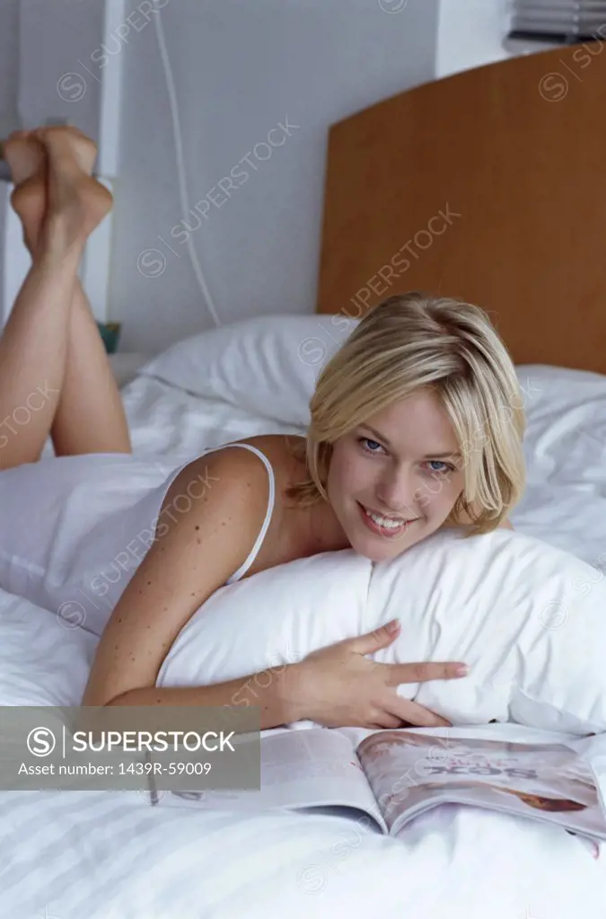 Girl reading in bed