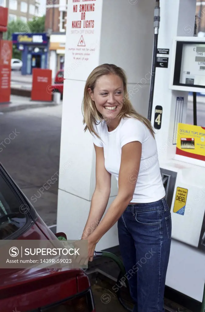 Girl at petrol station