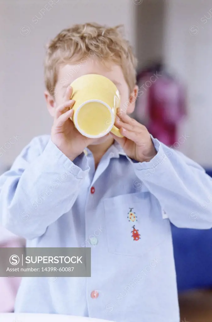 Boy drinking tea
