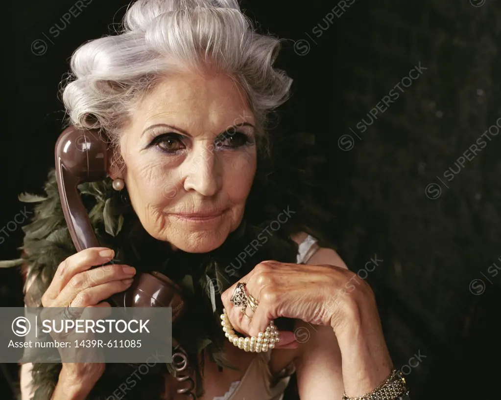 Glamorous senior woman on the telephone 