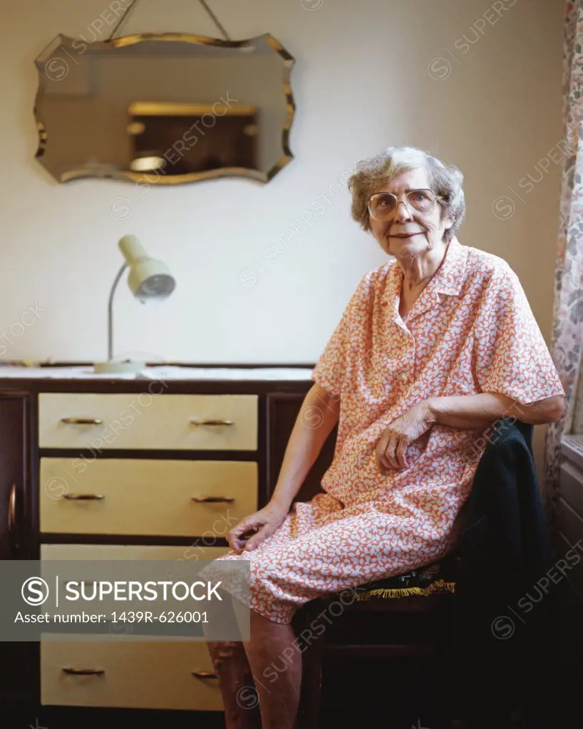 Elderly woman in her room 