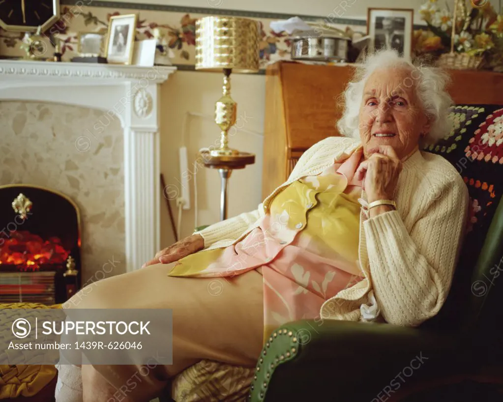 Elderly woman in living room