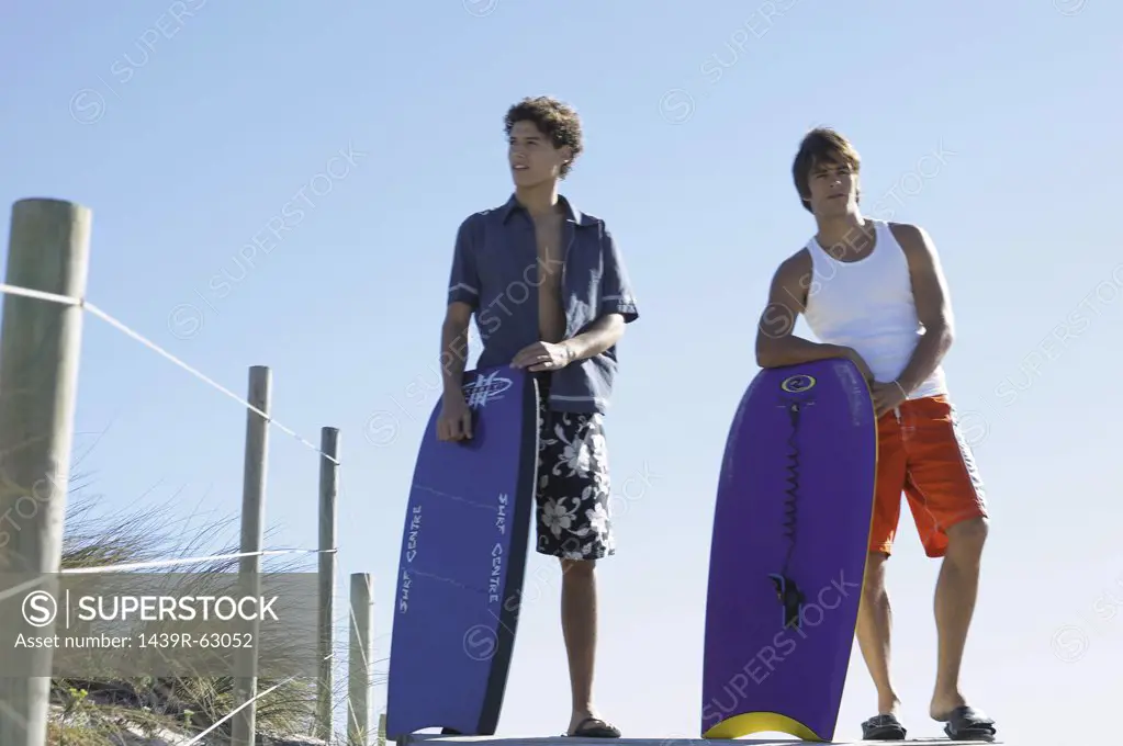 Men with boogie boards