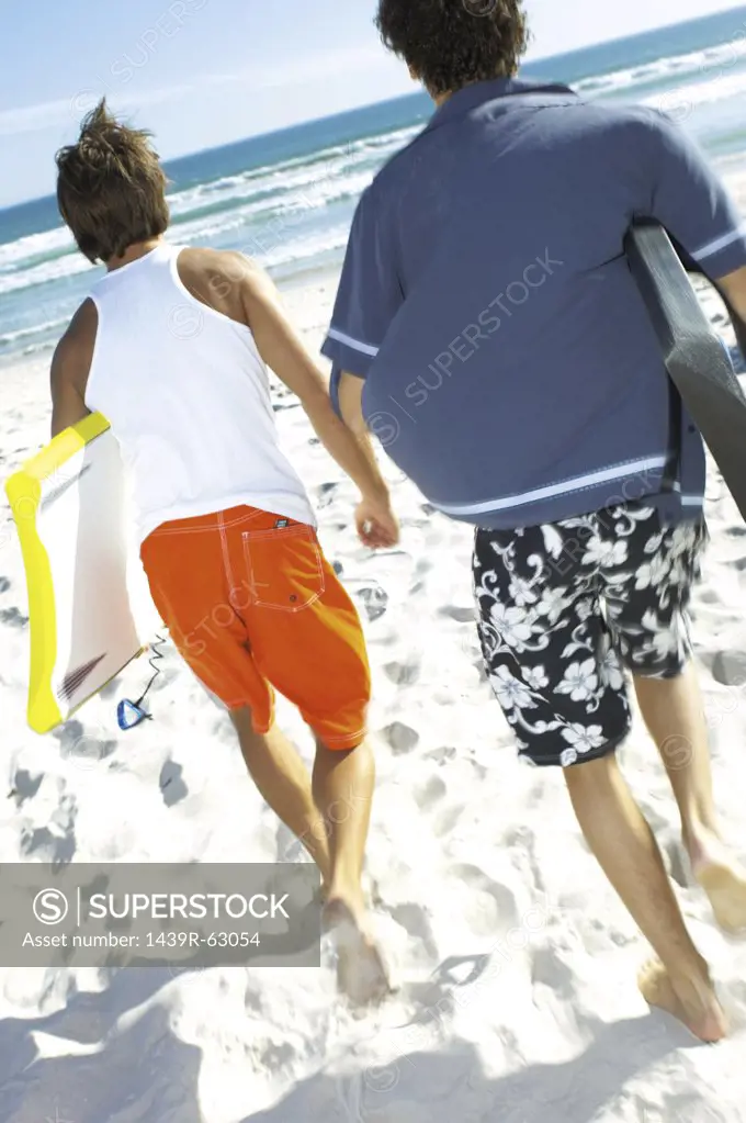 Men with boogie boards