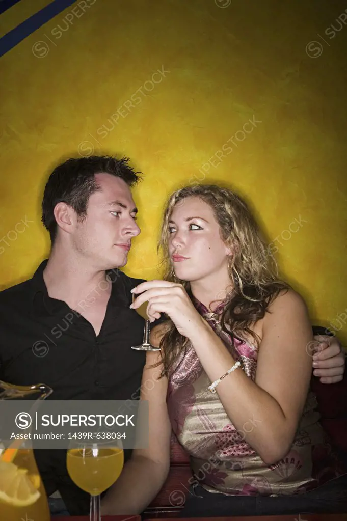 Hostile looking couple in a bar