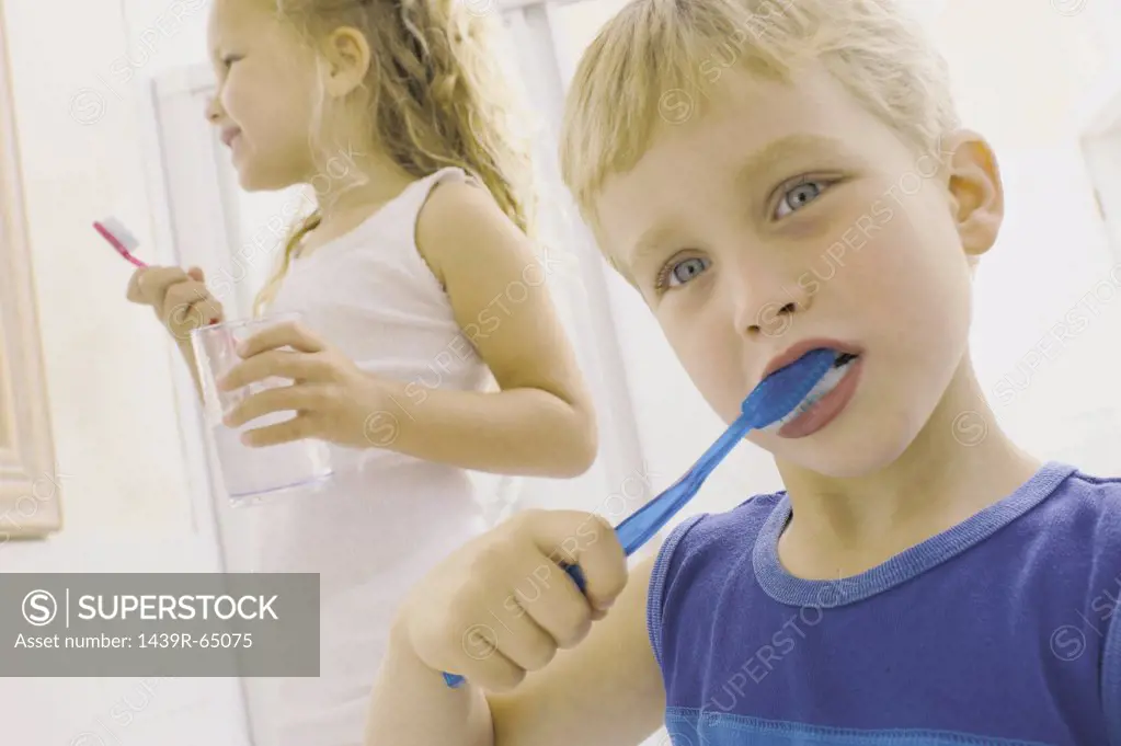 Kids brushing teeth
