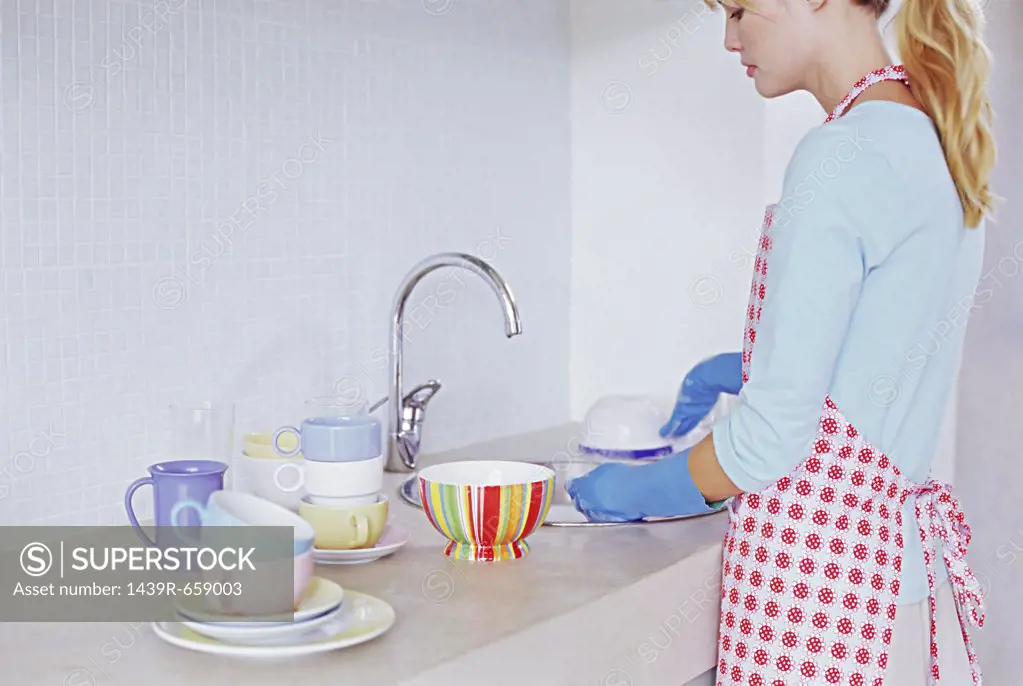 Woman washing up