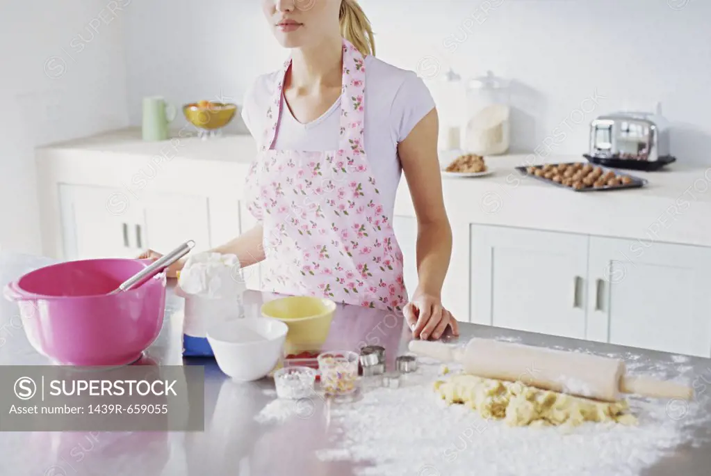 Woman preparing to make biscuits