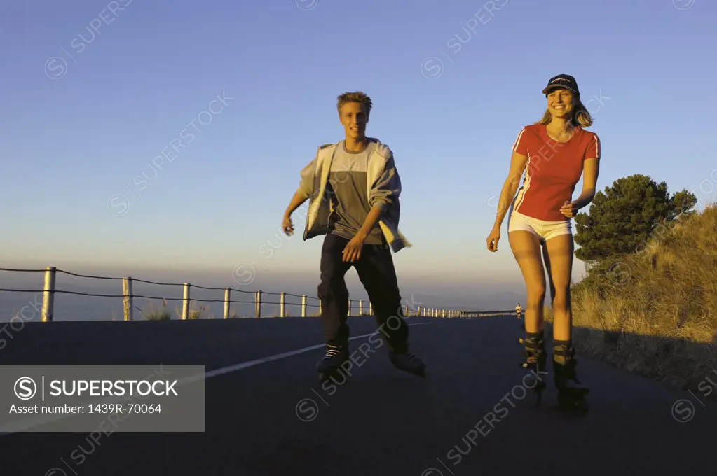 Couple roller-blading