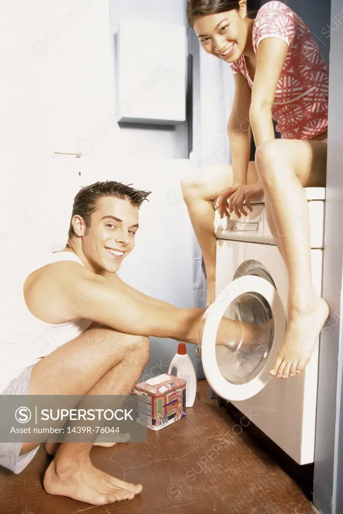 Couple with washing machine