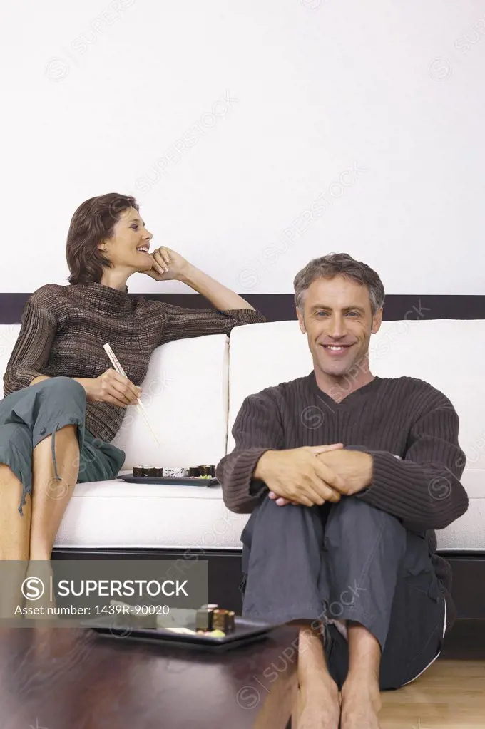 Man and woman in sitting room
