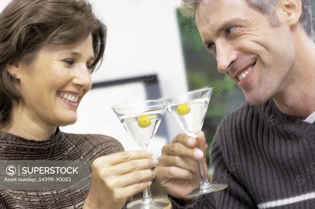 Man and woman having a cocktail