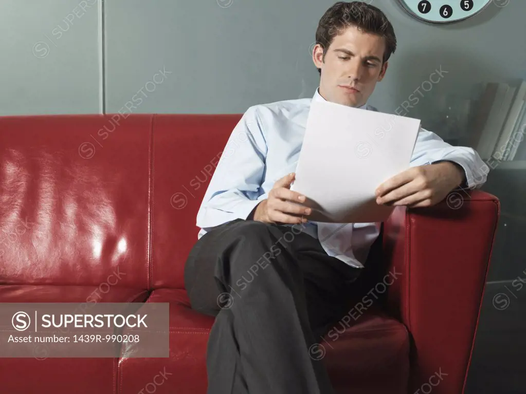 Man reading paperwork
