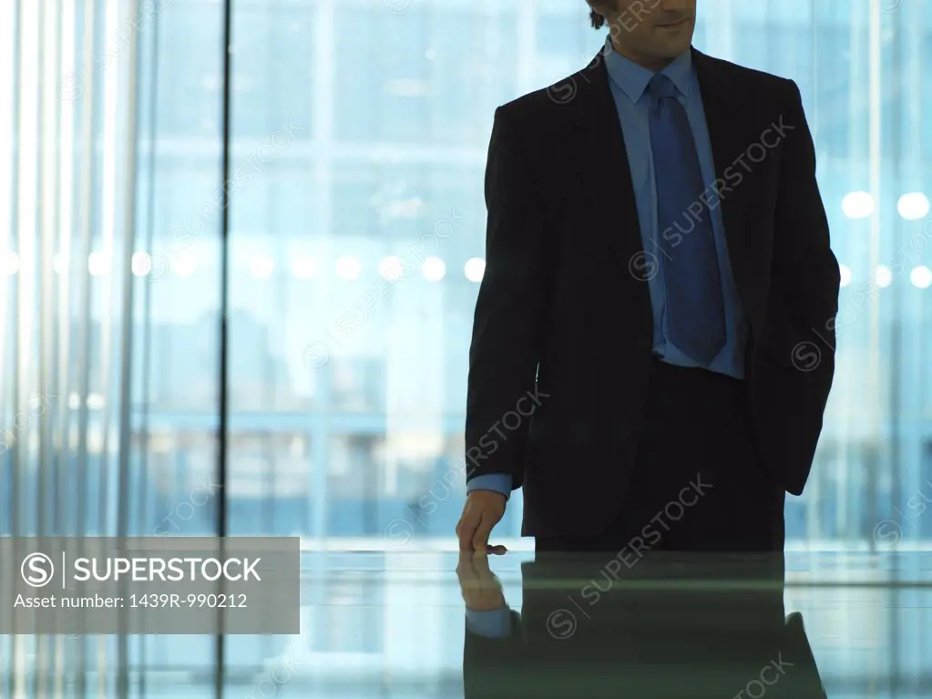 Businessman leaving meeting room