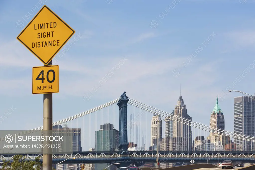 Road sign and Manhattan skyline