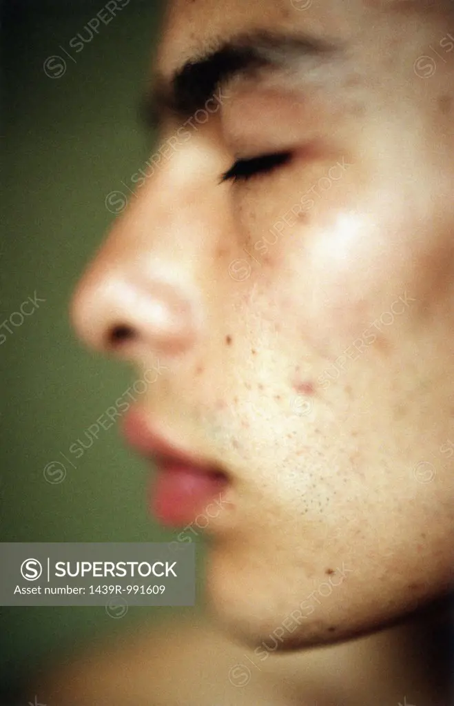 Profile of man with eyes closed