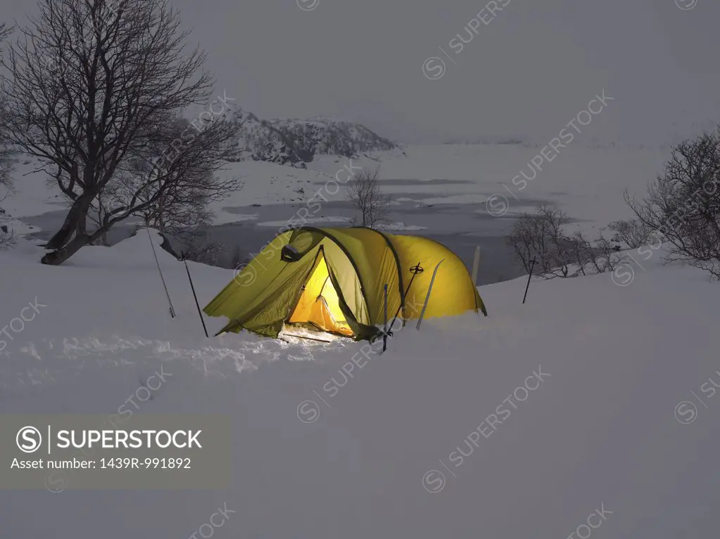 Yellow tent in the snow
