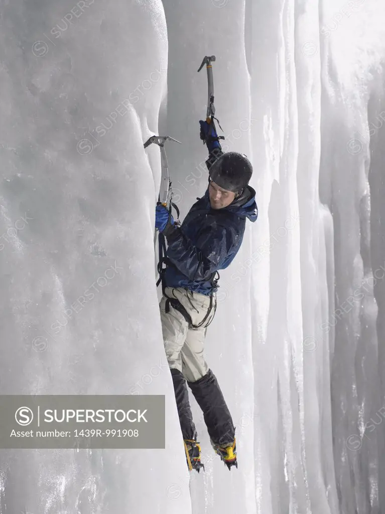 Man ice climbing