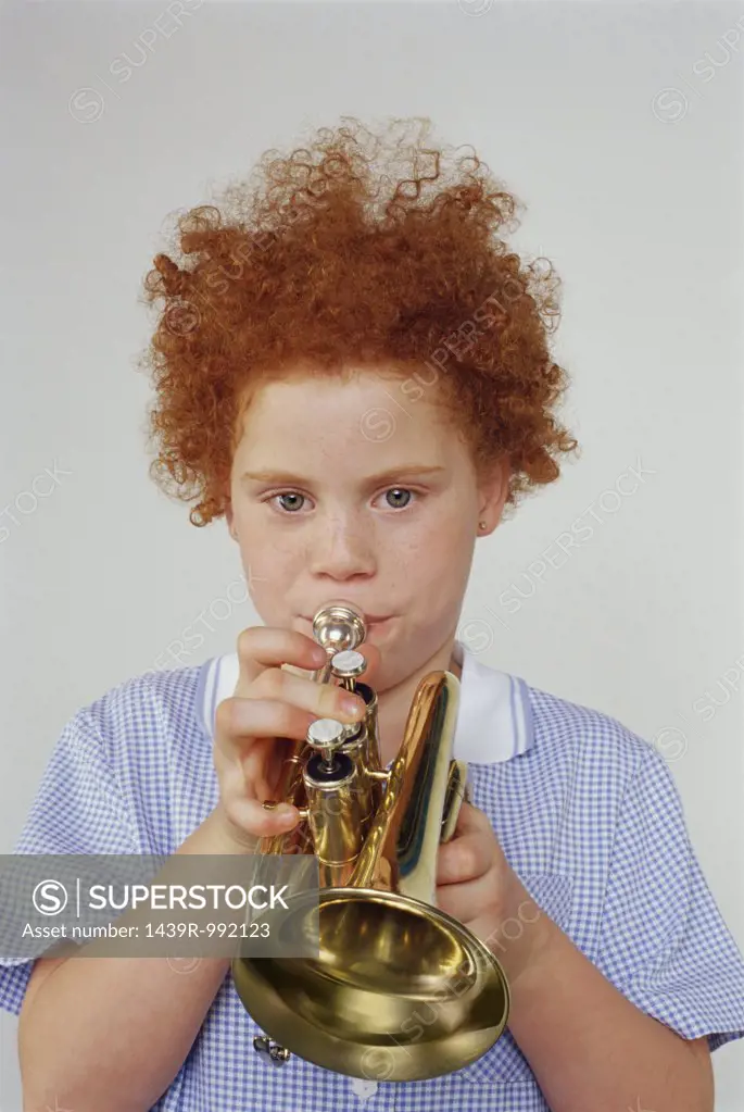 Girl playing the trumpet