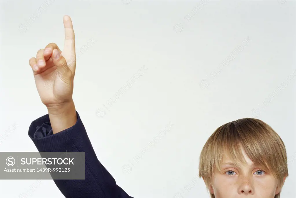 Boy raising his hand
