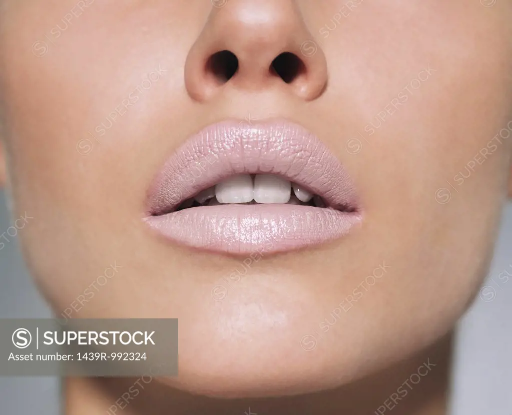 Woman wearing pale lipstick