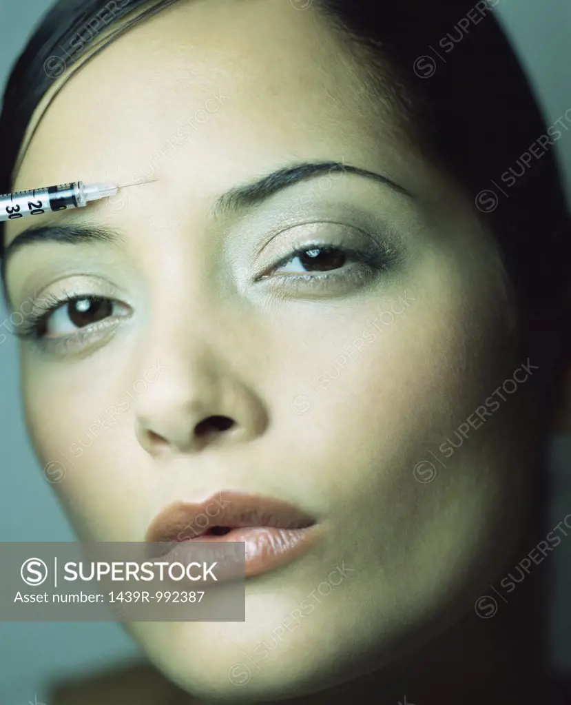 Woman having a botox injection