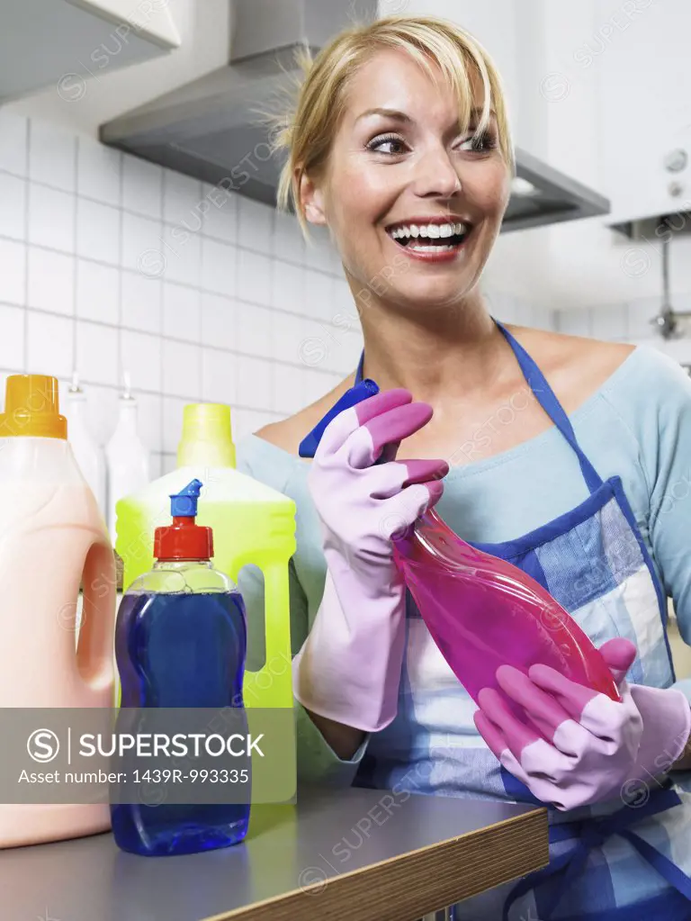 Housewife with cleaning products