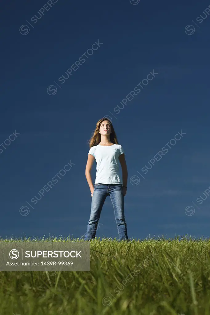Girl standing in a field