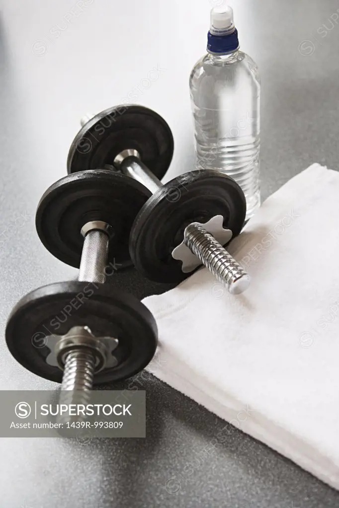 Dumbbells and mineral water