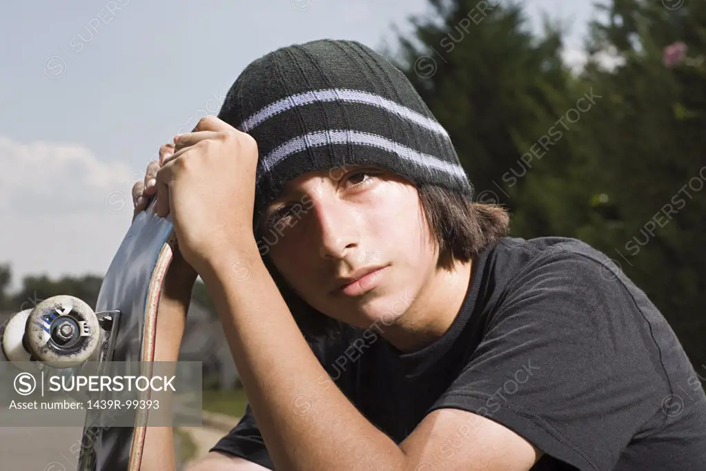 Teenage boy with a skateboard