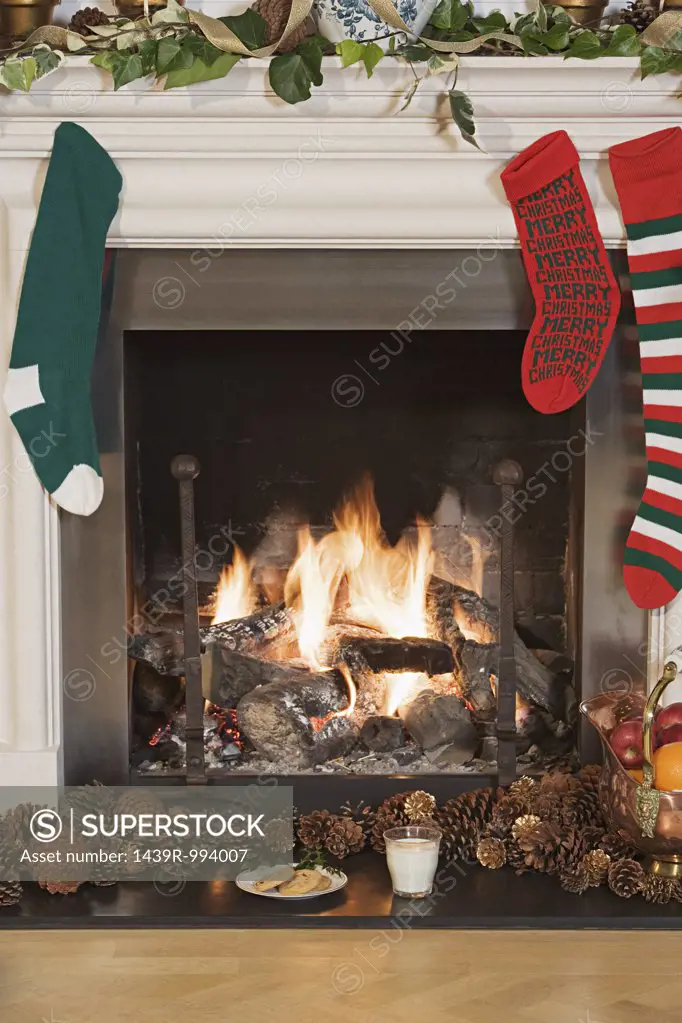 Christmas stockings hanging by the fire