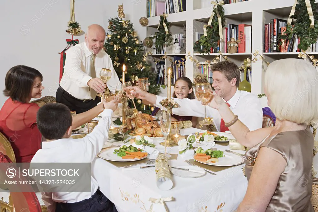 Family toasting at christmas