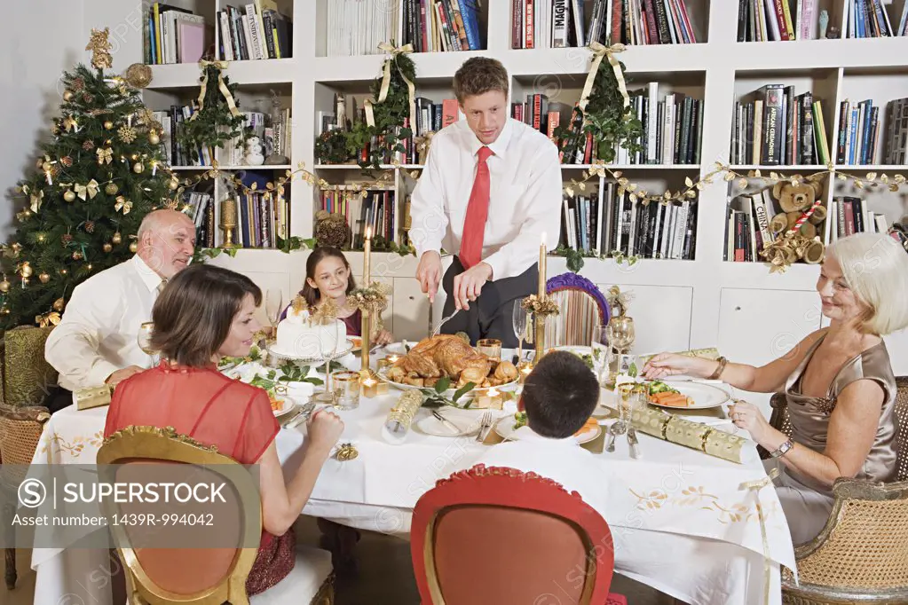 Family at dining table at christmas
