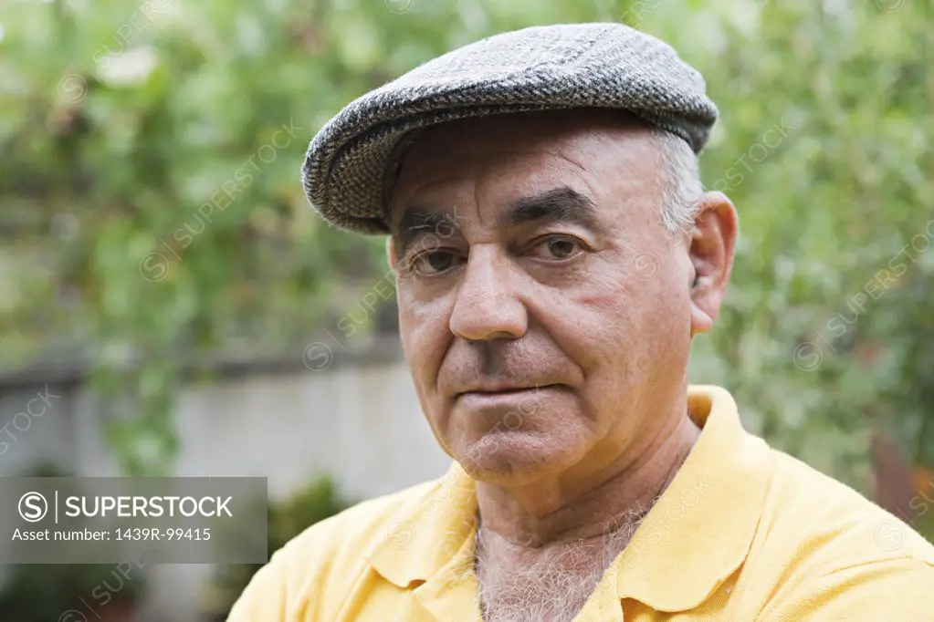 Portrait of a man wearing flat cap