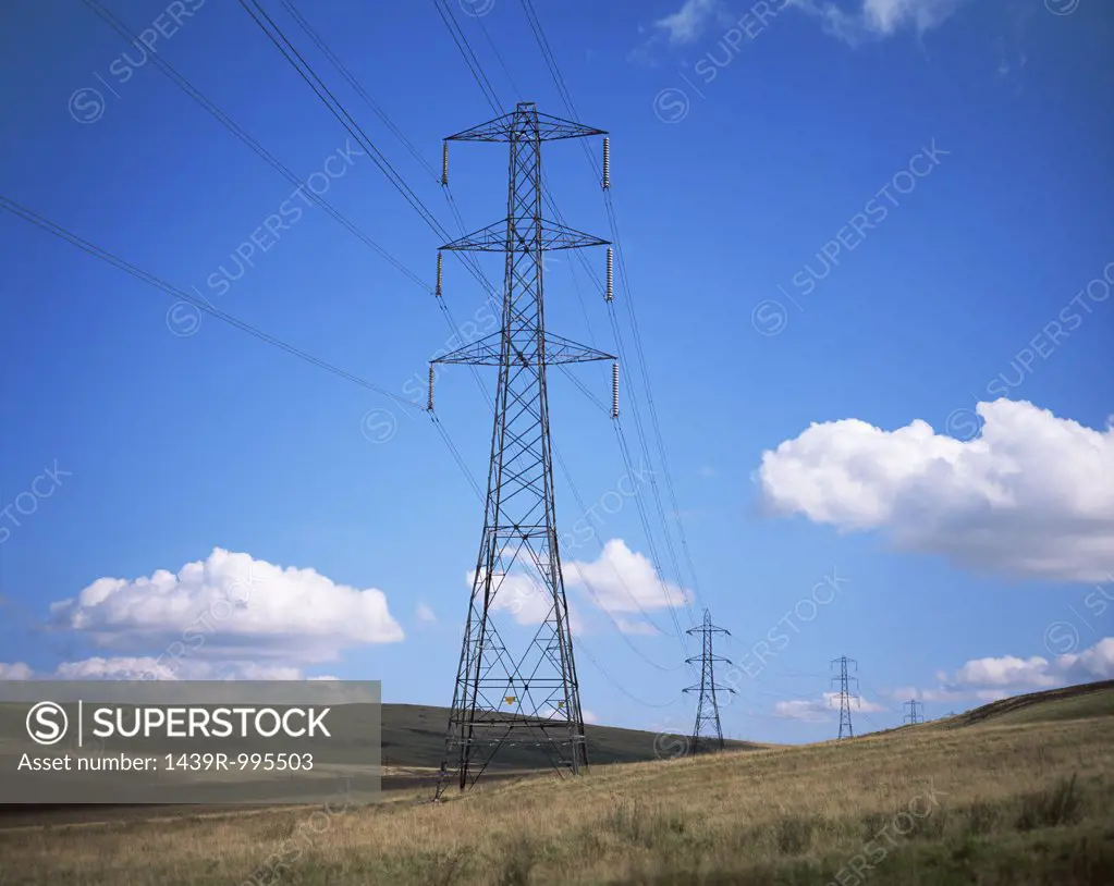Electrical towers in field