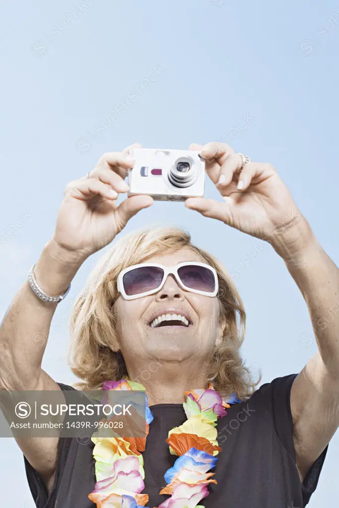 Woman taking a photograph