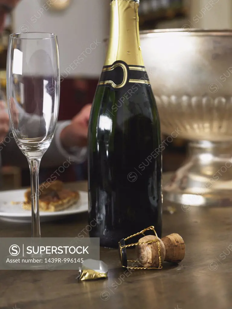 Champagne flute and bottle