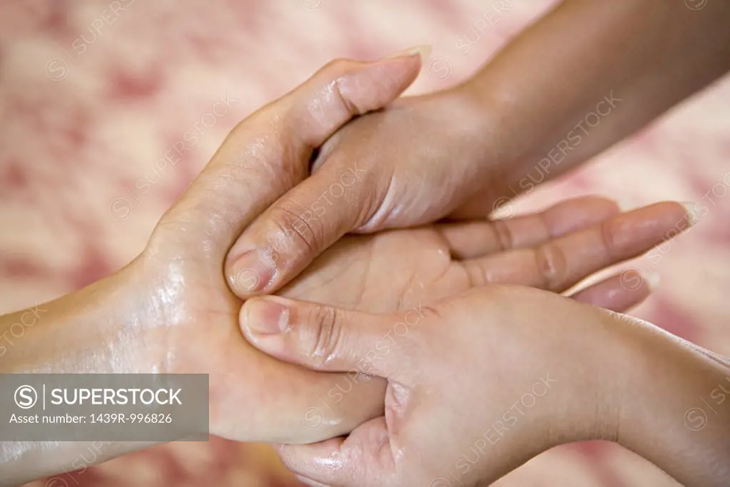 Hand being massaged