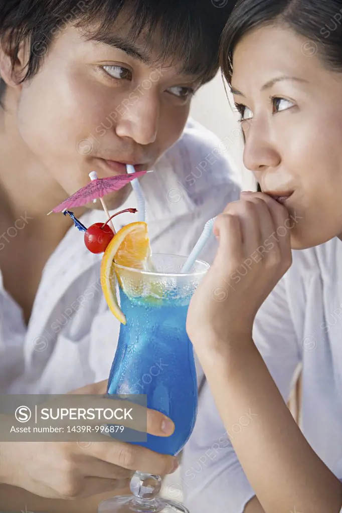 Couple drinking cocktail