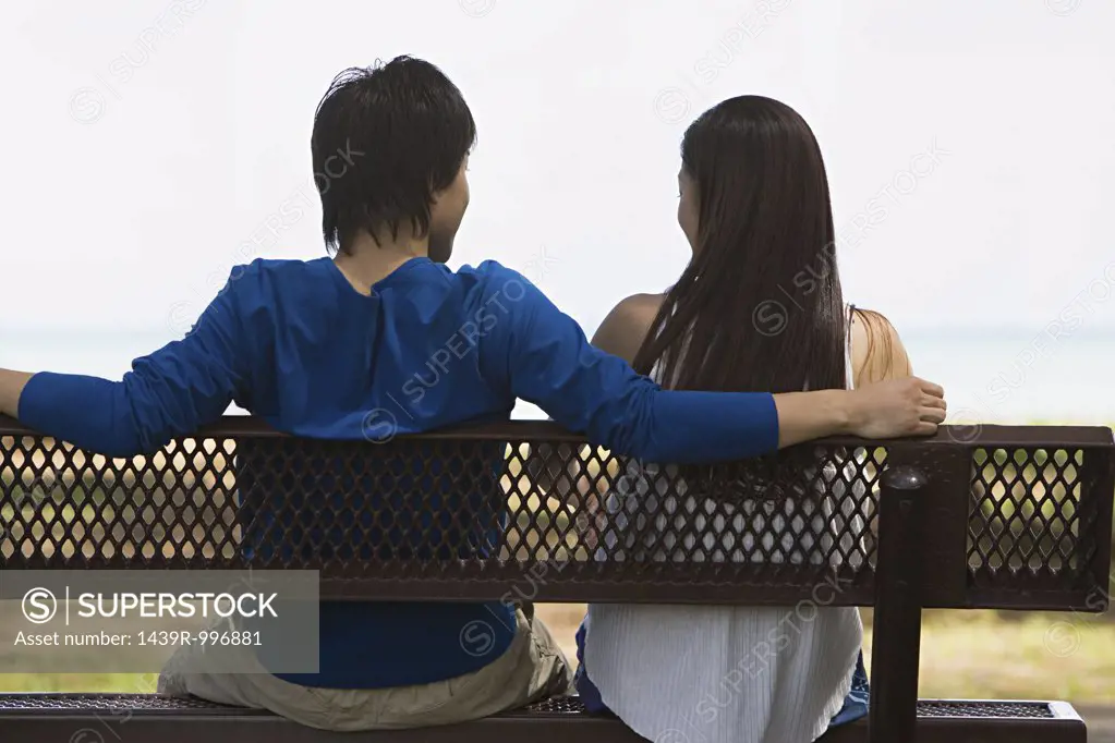 Couple sitting on bench