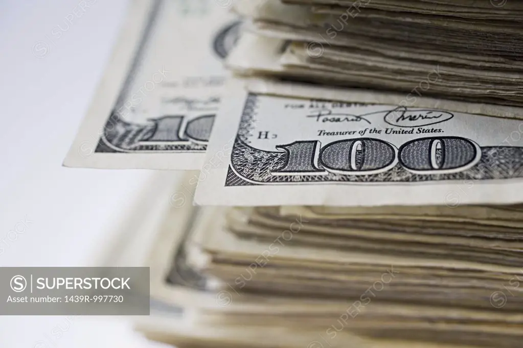 Pile of hundred dollar bills