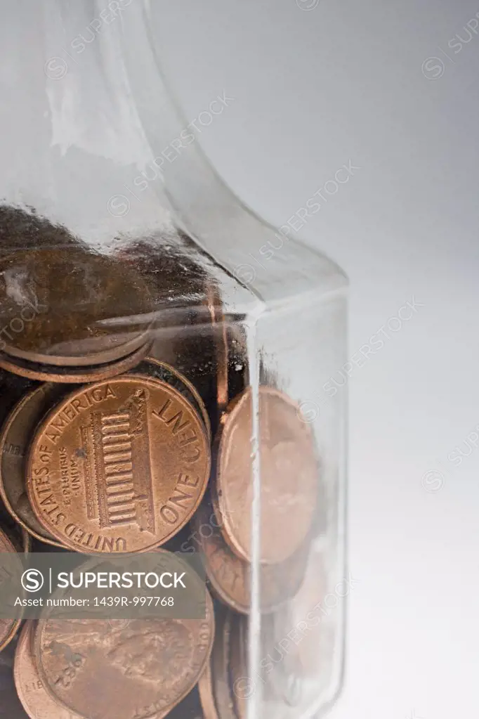 Decanter of one cent coins