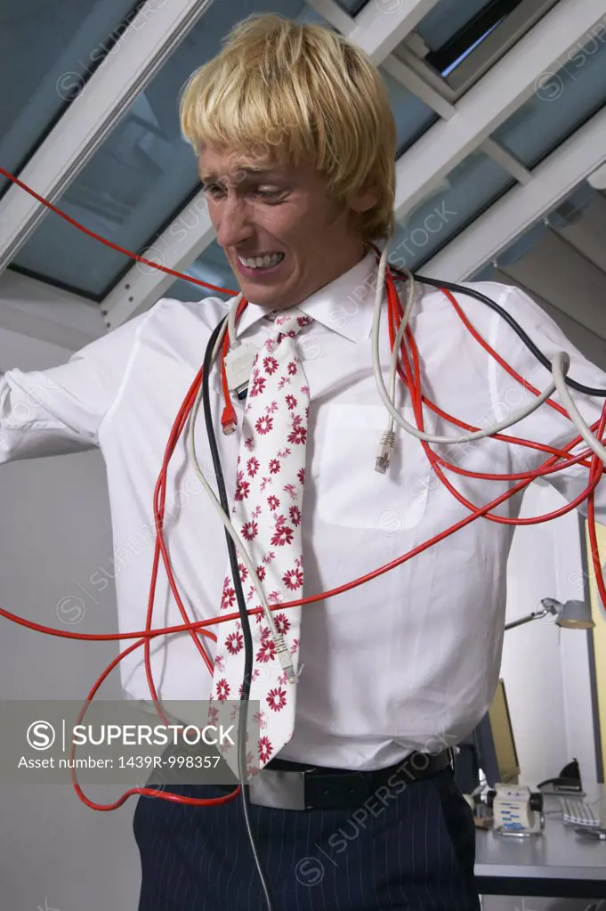 Man tangled in cables