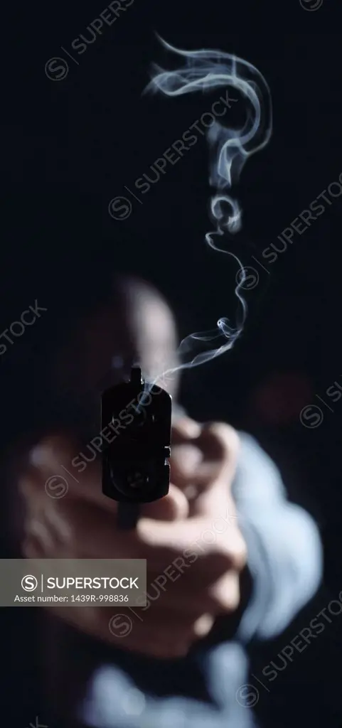 Question mark in gun smoke