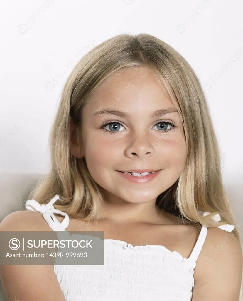 Blond girl smiling