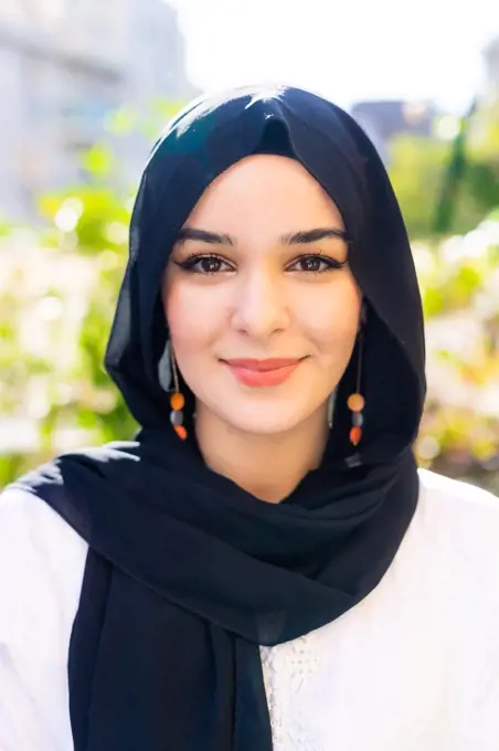 Portrait of a young woman wearing hijab