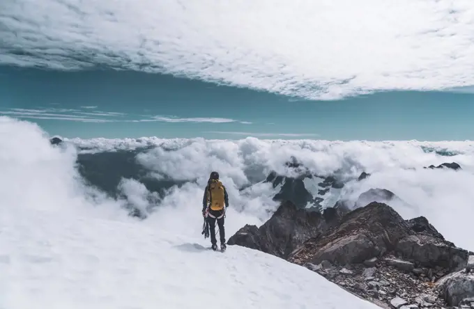 Climber on Tantalus Traverse, a classic alpine traverse close to Squamish, British Columbia, Canada