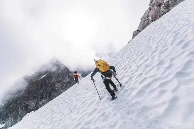 Climbers on Tantalus Traverse, a classic alpine traverse close to Squamish, British Columbia, Canada